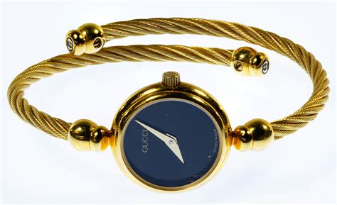 gucci vintage ladies gold lasso rope watch|value of old gucci watches.